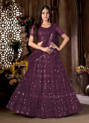 For A Designer Look,Grab These Lehenga Choli in Fine Colored.These Lehenga And Blouse Are Fabricated On Net Pair With Net Dupatta.Its Beautified With Foil Mirror,Multy Embroidery Work.