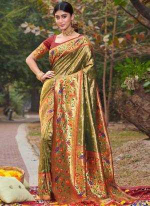 Garb These Party Wear Saree in Fine Colored.These Saree And Blouse is Fabricated On Paithani Silk.Its Beautified With Weavon Jari Designer Work.