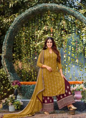 Attrective Looking These Special Plazzo Suit in Fine Colored Pair With Bottom And Dupatta.These Top Are Faux Georgette And Dupatta Are Fabricated On Naznin Pair With Dull Santoon Bottom.Its Beautified With Heavy Designer Badla Embroidery Work.