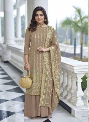 Attrective These Sharara Suit in Fine Colored Pair With Bottom And Dupatta.These Top And Dupatta Are Fabricated On Faux Georgette Pair With Santoon Bottom.Its Beautified With Santoon Inner.Its Beautified With Heavy Designer Multy Thread Embroidery Work.