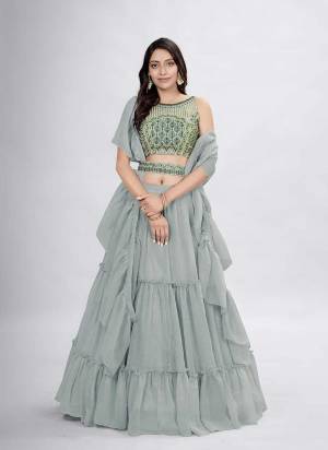 For A Designer Look,Grab These Lehenga Choli in Fine Colored.These Lehenga And Dupatta Are Fabricated On Chiffon Pair With Art Silk Blouse.Its Beautified With Designer Embroidery With Hand Work.