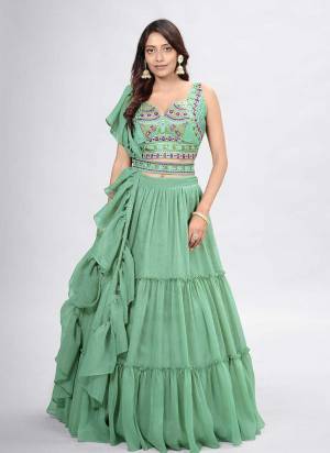 For A Designer Look,Grab These Lehenga Choli in Fine Colored.These Lehenga And Dupatta Are Fabricated On Chiffon Pair With Art Silk Blouse.Its Beautified With Designer Embroidery With Hand Work.