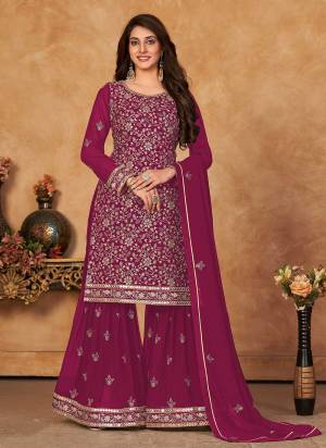 Grab These Designer Sharara Suit in Fine Colored Pair With Bottom And Dupatta.These Top And Dupatta Are Fabricated On Faux Georgette Pair With Santoon Bottom.Its Beautified With Santoon Inner.Its Beautified With Heavy Designer Jari,Sequance Embroidery Work.