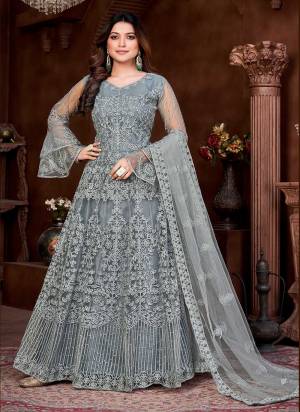 Grab These Anarkali Suit in Fine Colored Pair With Bottom And Dupatta.These Top Are Net And Dupatta Are Fabricated On Net Pair With Santoon Bottom.Its Beautified With Heavy Designer Embroidery Work.