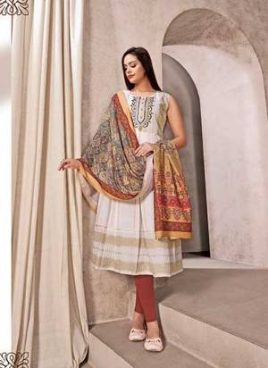 Grab These Beautiful Looking Readymade Kurti With Dupatta.These Kurti is Fabricated On Mal Cotton And Muslin Dupatta.Its Beautified With Wevon Lining,Digital Printed With Hand Mirror Work.