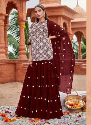 Grab These Designer Free Size Stitched Skirt Suit in Fine Colored Pair With Bottom And Dupatta.These Top And Dupatta Are Fabricated On Faux Georgette Pair With Faux Georgette Bottom.Its Beautified With Micro Row Silk Inner.Its Beautified With Heavy Designer Cotton Embroidery Work.