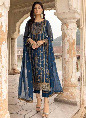 Garb These Designer Suit in Fine Colored Pair With Bottom And Dupatta.These Top Are Faux Georgette And Dupatta Are Fabricated On Net Pair With Santoon Bottom.Its Beautified With Santoon Inner.Its Beautified With Designer Floral Sequance Embroidery Work.