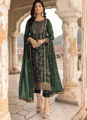 Garb These Designer Suit in Fine Colored Pair With Bottom And Dupatta.These Top Are Faux Georgette And Dupatta Are Fabricated On Net Pair With Santoon Bottom.Its Beautified With Santoon Inner.Its Beautified With Designer Floral Sequance Embroidery Work.