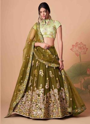 For A Designer Look,Grab These Lehenga Choli in Fine Colored.These Lehenga And Dupatta Are Fabricated On Soft Net Pair With Art Silk Blouse.Its Beautified With Designer Thread,Mirror,Dori,Sequance Embroidery Work.