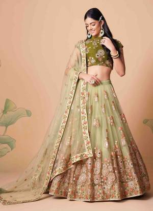 For A Designer Look,Grab These Lehenga Choli in Fine Colored.These Lehenga And Dupatta Are Fabricated On Soft Net Pair With Art Silk Blouse.Its Beautified With Designer Thread,Mirror,Dori,Sequance Embroidery Work.