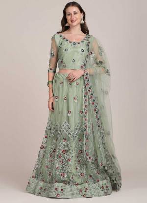 For A Designer Look,Grab These Lehenga Choli in Fine Colored.These Lehenga Choli Are Net And Dupatta Are Fabricated On Net Pair.Its Beautified With Fancy Designer Embroidery Work.