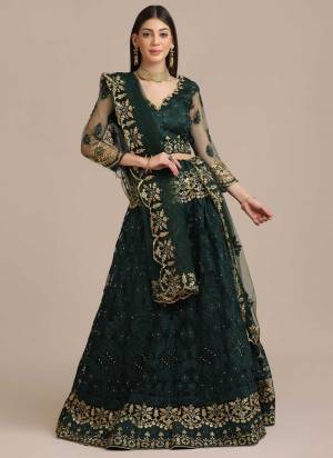 For A Designer Look,Grab These Lehenga Choli in Fine Colored.These Lehenga Choli Are Net And Dupatta Are Fabricated On Net Pair.Its Beautified With Fancy Designer Embroidery,Stone Work.