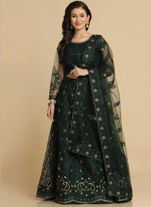 For A Designer Look,Grab These Lehenga Choli in Fine Colored.These Lehenga Choli Are Net And Dupatta Are Fabricated On Net Pair.Its Beautified With Fancy Designer Embroidery,Stone Work.