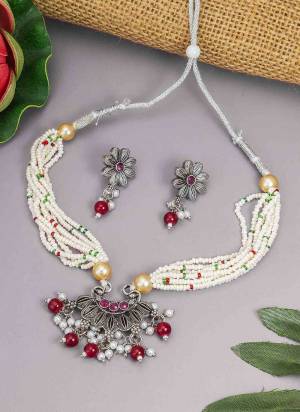 Grab These Beautifil Silver Colored Necklace.These Necklace is Come Oxidized Material And Beautified With Patwa Work.