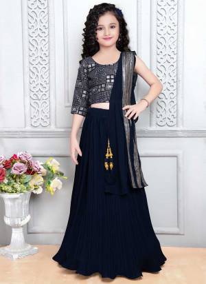 For A Designer Look,Grab These Kidswear Readymade Lehenga Choli in Fine Colored.These Lehenga And Choli Are Fabricated On Faux Georgette Pair With Faux Georgette Dupatta.Its Beautified With Designer Sequance Embroidery Work With Crush.