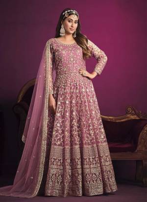 Grab These Anarkali Suit in Fine Colored Pair With Bottom And Dupatta.These Top Are Net And Dupatta Are Fabricated On Net Pair With Santoon Bottom.Its Beautified With Santoon Inner.Its Beautified With Heavy Designer Sequance Embroidery Work.