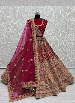 For A Designer Look,Grab These Lehenga Choli With Dupatta in Fine Colored.These Lehenga And Choli Are Velvet And Dupatta Are Fabricated On Soft Net Pair.Its Beautified With Designer Fancy Multy Thread Embroidery,Zarkan Diamond Work.