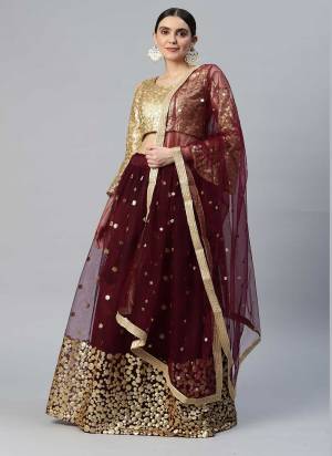 Heavy Designer Lehenga Choli In Golden And Blue Color Fabricated On Net Beautified With Heavy Attractive Embroidery. 