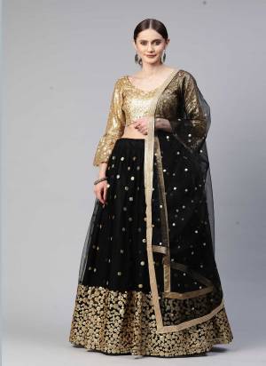 Heavy Designer Lehenga Choli In Golden And Blue Color Fabricated On Net Beautified With Heavy Attractive Embroidery. 