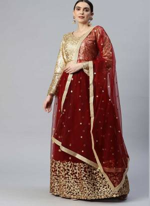 Heavy Designer Lehenga Choli In Golden And Blue Color Fabricated On Net Beautified With Heavy Attractive Embroidery. 