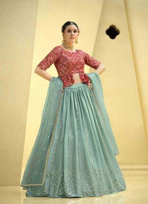 A Designer Look,Grab These Lehenga Choli With Dupatta in Fine Colored.These Lehenga Are Chinon Silk And Blouse Are Fabricated On Art Silk Pair With Net Dupatta.Its Beautified With Designer Printed,Sequance Embroidery Work.