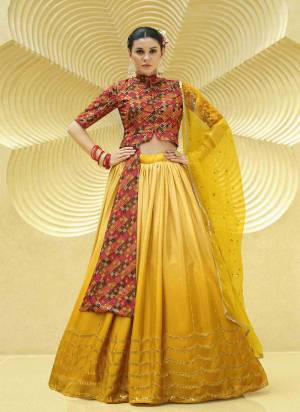 A Designer Look,Grab These Lehenga Choli With Dupatta in Fine Colored.These Lehenga Are Chinon Silk And Blouse Are Fabricated On Art Silk Pair With Net Dupatta.Its Beautified With Designer Printed,Sequance Embroidery Work.