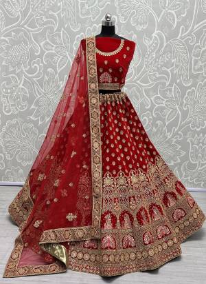 For A Designer Look,Grab These Lehenga Choli With Dupatta in Fine Colored.These Lehenga And Choli Are Velvet And Dupatta Are Fabricated On Soft Net Pair.Its Beautified With Designer Fancy Multy Thread Embroidery,Zarkan Diamond Work.