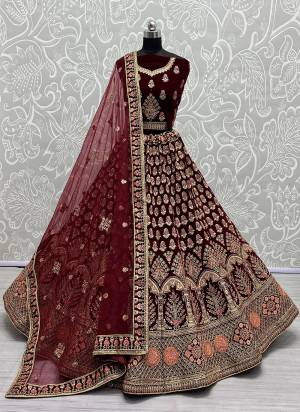 For A Designer Look,Grab These Lehenga Choli With Dupatta in Fine Colored.These Lehenga And Choli Are Velvet And Dupatta Are Fabricated On Soft Net Pair.Its Beautified With Designer Fancy Dori,Sequance,Jari,Multy Thread Embroidery Work.