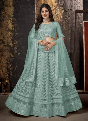 Grab These Beautiful Colored Lehenga Choli.These Lehenga and Blouse Are Fabricated On Net Pair With Net Dupatta.Its Beautified With Heavy Thread,Sequance Embroidery Work.