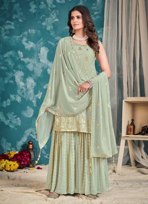 Attrective These Readymade Sharara Suit in Fine Colored Pair With Bottom And Dupatta.These Top Are Georgette And Dupatta Are Fabricated On Georgette Pair With Georgette Bottom.Its Beautified With Heavy Designer Sequance,Thread Embroidery Work.