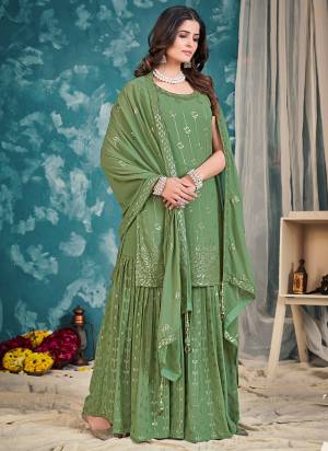 Attrective These Readymade Sharara Suit in Fine Colored Pair With Bottom And Dupatta.These Top Are Georgette And Dupatta Are Fabricated On Georgette Pair With Georgette Bottom.Its Beautified With Heavy Designer Sequance,Thread Embroidery Work.