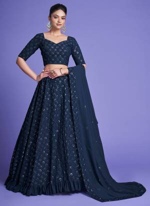 For A Designer Look,Grab These Lehenga Choli in Fine Colored.These Lehenga And Blouse Are Fabricated On Diamond Georgette Pair With Diamond Georgette Dupatta.Its Beautified With Heavy Thread,Sequance Embroidery Work.