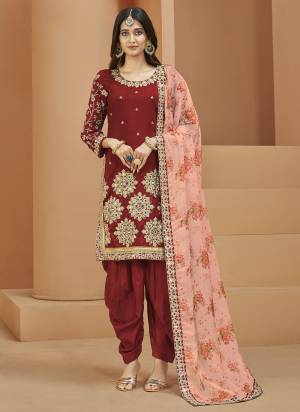 Grab These Patiyala Suit in Fine Colored Pair With Bottom And Dupatta.These Top Are Art Silk And Dupatta Are Fabricated On Organza Pair With Santoon Bottom.Its Beautified With Santoon Inner.Its Beautified With Designer Heavy Embroidery Work With Printed Dupatta.