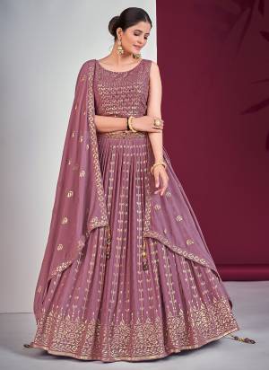 For A Designer Look,Grab These Readymade Lehenga Choli in Fine Light Colored.These Lehenga And Blouse Are Fabricated On Georgette Pair With Georgette Dupatta.Its Beautified With Designer Heavy Sequance,Mirror Embroidery Work.