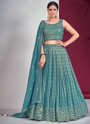 For A Designer Look,Grab These Readymade Lehenga Choli in Fine Light Colored.These Lehenga And Blouse Are Fabricated On Georgette Pair With Georgette Dupatta.Its Beautified With Designer Heavy Sequance,Mirror Embroidery Work.