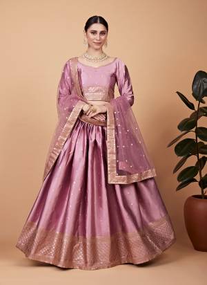 For A Designer Look,Grab These Lehenga Choli in Fine Colored.These Lehenga And Blouse Are Fabricated On Tabi Silk Pair With Net Dupatta.Its Beautified With Designer Thread,Sequance Embroidery Work.