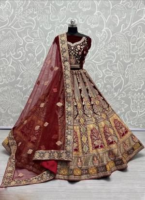 For A Designer Look,Grab These Lehenga Choli With Dupatta in Fine Colored.These Lehenga And Choli Are Velvet And Dupatta Are Fabricated On Soft Net Pair.Its Beautified With Designer Fancy Multy Thread,Dori,Jari Embroidery Work.