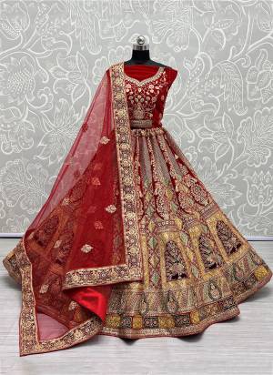 For A Designer Look,Grab These Lehenga Choli With Dupatta in Fine Colored.These Lehenga And Choli Are Velvet And Dupatta Are Fabricated On Soft Net Pair.Its Beautified With Designer Fancy Multy Thread,Dori,Jari Embroidery Work.