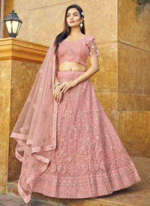 Garb This Partywear Fine Color Heavy Designer Lehemga Choli Fabric Are Soft Net And And Dupatta Soft Net In Fabricated Beautified With Attrective Reaham,Real Mirror Embroidery,Diamond Work. Buy Now.