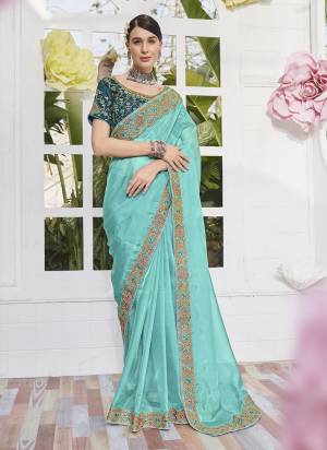 Garb These Party Wear Saree in Fine Colored.These Saree Are Satin Organza And Blouse is Fabricated On Art Silk Pair.Its Beautified With Heavy Embroidery Work.