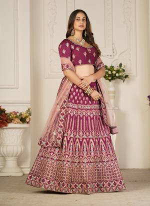 For A Designer Look,Grab These Lehenga Choli in Fine Colored.These Lehenga Choli Are Taffeta Silk And Dupatta Are Fabricated On Net Pair.Its Beautified With Fancy Designer Thread Embroidery Work.