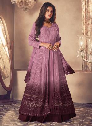 Garb These Anarkali Suit in Fine Colored Pair With Bottom And Dupatta.These Top And Bottom Are Faux Georgette And Pair With Faux Georgette Bottom.Its Beautified With Nazmin Dupatta.Its Beautified With Heavy Designer Thread,Sequance Embroidery Work.