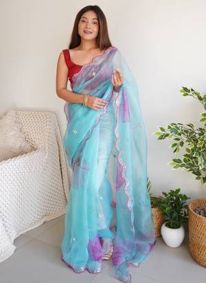 Garb These Party Wear Saree in Fine Colored.These Saree Are Organza And Blouse is Fabricated On Art Silk.Its Beautified With Designer Cut Work With Khatli Work.