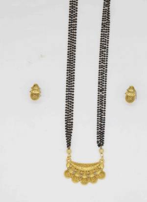 Grab These Beautifil Golden Colored Mangalsutra.These Earring is Come Mazzak Material And Beautified With Temple Work.