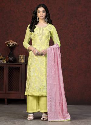 Grab These Salwar Suit in Fine Colored Pair With Bottom And Dupatta.These Top Are Banarasi Silk And Dupatta Are Fabricated On Fancy Pair With Santoon Bottom.Its Beautified With Wevon Designer.