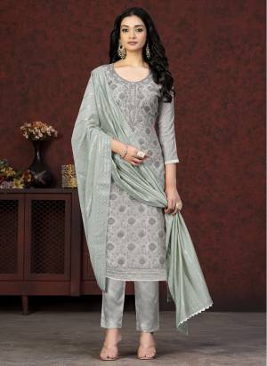 Grab These Salwar Suit in Fine Colored Pair With Bottom And Dupatta.These Top Are Modal Silk And Dupatta Are Fabricated On Soft Banarasi Pair With Santoon Bottom.Its Beautified With Printed,Hand Work With Wevon Designer.