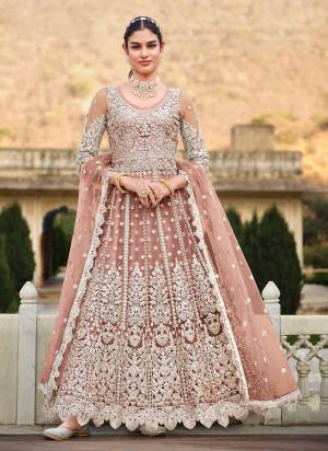 Grab These Anarkali Suit in Fine Colored Pair With Bottom And Dupatta.These Top And Dupatta Are Fabricated On Butterfly Net Pair With Crepe Bottom.Its Beautified With Heavy Designer Coding Embroidery With Stone Work.