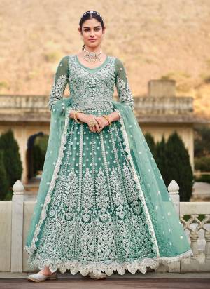 Grab These Anarkali Suit in Fine Colored Pair With Bottom And Dupatta.These Top And Dupatta Are Fabricated On Butterfly Net Pair With Crepe Bottom.Its Beautified With Heavy Designer Coding Embroidery With Stone Work.