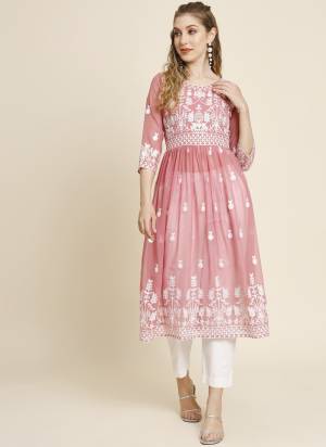 Garb These Beautiful Looking Readymade Anarkali Shape Kurti.These Kurti is Fabricated On Georgette.Its Beautified With Designer Thread Embroidery Work.