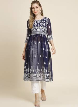 Garb These Beautiful Looking Readymade Anarkali Shape Kurti.These Kurti is Fabricated On Georgette.Its Beautified With Designer Thread Embroidery Work.